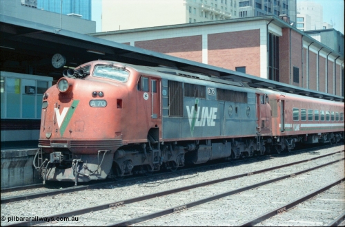 145-05
Spencer Street Station dual gauge Platform Number 1, broad gauge V/Line A class A 70 Clyde Engineering EMD model AAT22C-2R serial 84-1187 rebuilt from B 70 Clyde Engineering EMD model ML2 serial ML2-11.
Keywords: A-class;A70;Clyde-Engineering-Rosewater-SA;EMD;AAT22C-2R;84-1187;rebuild;bulldog;