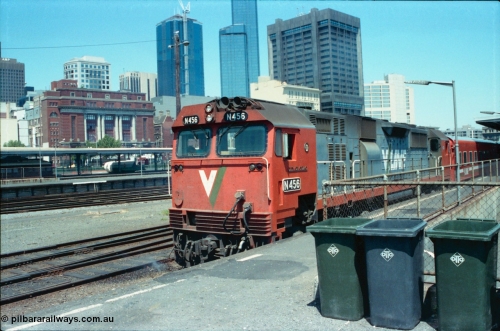 145-07
Spencer Street Station platform No.6 view, old Melbourne skyline, V/Line N class loco N 456 'City of Colac' with serial 85-1224 a Clyde Engineering Somerton Victoria built EMD model JT22HC-2 with a down pass.
Keywords: N-class;N456;Clyde-Engineering-Somerton-Victoria;EMD;JT22HC-2;85-1224;