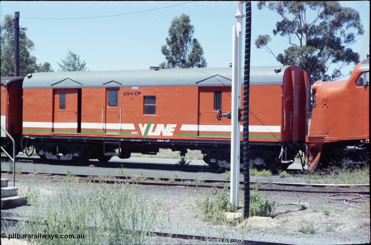 146-01
Seymour loco depot, broad gauge V/Line CP type bogie guards van 294 CP, the CP van was built in June 1957 by AE Goodwin NSW as CP 6, August 1985 reclassified to VVCP 6 and then 1987 to 294 CP. Side view, on the scratch set.
Keywords: CP-van;CP294;VVCP-van;VVCP6;CP6;AE-Goodwin;