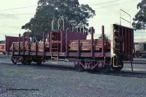 147-32
Seymour loco depot, a loaded V/Line VZTX type bogie sleeper transport waggon VZTX 2, started out as BP type Steel Mail/Baggage Van BP 77 built in 1959 by Newport Workshops, went on to become VBAX 2 in 1979, then converted 1990 to VZTX type.
Keywords: VZTX-type;VZTX2;Victorian-Railways-Newport-WS;BP-type;VBAX-type;