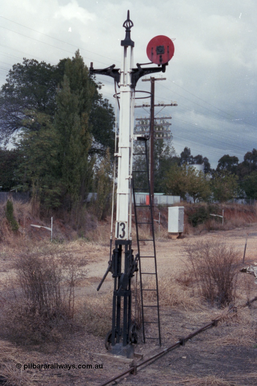 148-12
Wangaratta, half stripped former twin disc Signal Post 13 with Left-hand Disc removed, was from Carriage Dock to Siding 'F', Right-hand Disc from Carriage Dock to 'A' towards Post 9.

