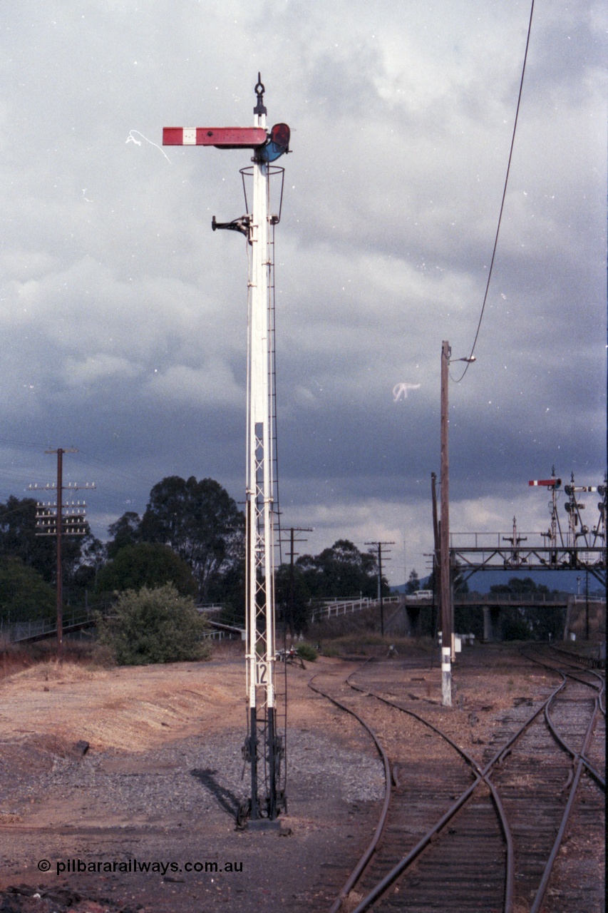 148-13
Wangaratta, Signal Post 12, one arm and one removed disc, Up Signals, arm is Home Signal from No. 1 Road to 'A' to Post 9. The Disc was from No. 1 Road to Siding 'F'.
