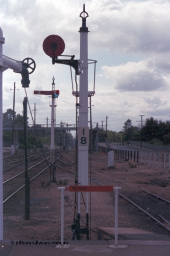 148-18
Wangaratta, Signal Post 18 at the end of the platform, Single Disc Signal from Siding 'A' to Main Line, beyond that is semaphore Signal Post 20 Down Home from No.1 Road to Main Line to Post 24, and water stand pipe at left.
