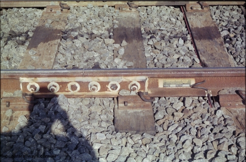 151-02
Gheringhap, insulated rail joint in mainline at site of points for Siding A extension to a loop, near down distant and Butchers Road grade crossing.
