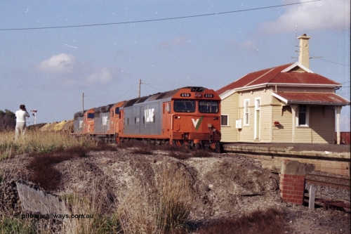 151-14
Gheringhap, broad gauge V/Line Adelaide bound goods train 9169 on No.1 Road under the power of G class G 531 Clyde Engineering EMD model JT26C-2SS serial 88-1261, C class C 510 Clyde Engineering EMD model GT26C serial 76-833 and C 509 serial 76-832, this shot taken from the former No.2 platform.
Keywords: G-class;G531;Clyde-Engineering-Somerton-Victoria;EMD;JT26C-2SS;88-1261;