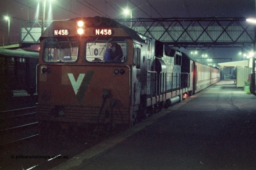 151-18
Traralgon station platform, V/Line broad gauge N class N 458 'City of Maryborough' Clyde Engineering EMD model JT22HC-2 serial 85-1226 and N set await departure with 8406 up passenger train.
Keywords: N-class;N458;Clyde-Engineering-Somerton-Victoria;EMD;JT22HC-2;85-1226;