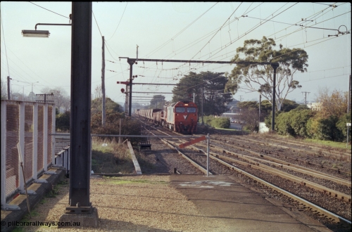 152-08
Morwell station yard, V/Line broad gauge train 9444 goods to Nth Geelong arrives into the yard from the briquette sidings behind G class G 543 Clyde Engineering EMD model JT26C-2SS serial 89-1276 and X class X 43 Clyde Engineering EMD model G26C serial 70-706, taken from station platform, auxiliary frame and signals for sidings visible .
Keywords: G-class;G543;Clyde-Engineering-Somerton-Victoria;EMD;JT26C-2SS;89-1276;