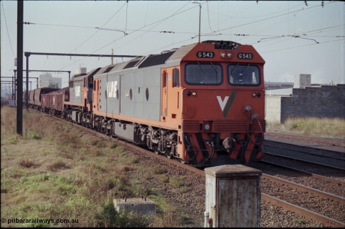 152-11
Pakenham station, V/Line broad gauge up 9444 goods to Nth Geelong arrives behind G class G 543 Clyde Engineering EMD model JT26C-2SS serial 89-1276 and X class X 43 Clyde Engineering EMD model G26C serial 70-706 with their load of briquettes.
Keywords: G-class;G543;Clyde-Engineering-Somerton-Victoria;EMD;JT26C-2SS;89-1276;
