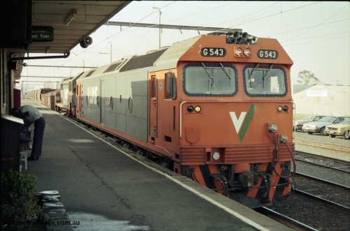152-15
Pakenham station platform, V/Line broad gauge up 9444 goods to Nth Geelong with G class G 543 Clyde Engineering EMD model JT26C-2SS serial 89-1276 and X class X 43 Clyde Engineering EMD model G26C serial 70-706 has a crew change at the platform.
Keywords: G-class;G543;Clyde-Engineering-Somerton-Victoria;EMD;JT26C-2SS;89-1276;