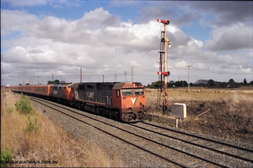 153-1-10
Warrenheip, down Dimboola pass with V/Line broad gauge locos N class N 475 'City of Moe' Clyde Engineering EMD model JT22HC-2 serial 87-1204 and an A class with N set pass semaphore signal post 11.
Keywords: N-class;N475;Clyde-Engineering-Somerton-Victoria;EMD;JT22HC-2;87-1204;