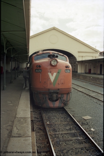 153-1-11
Ballarat station platform looking from the east end of the platform, canopy behind broad gauge V/Line A class A 79 Clyde Engineering EMD model AAT22C-2R serial 84-1188 rebuilt from B 79 Clyde Engineering EMD model ML2 serial ML2-20 at platform, driver climbing aboard.
Keywords: A-class;A79;Clyde-Engineering-Rosewater-SA;EMD;AAT22C-2R;84-1188;rebuild;bulldog;