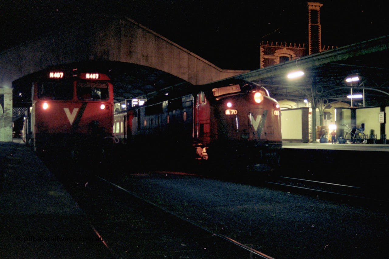 153-3-24
Geelong station building and platform, night shot, V/Line broad gauge passenger train, down Warrnambool with A class A 70 Clyde Engineering EMD model AAT22C-2R serial 84-1187 rebuilt from B 70 Clyde Engineering EMD model ML2 serial ML2-11 pauses at platform one with N class N 467 'City of Stawell' Clyde Engineering EMD model JT22HC-2 serial 86-1196 in platform two.
Keywords: A-class;A70;Clyde-Engineering-Rosewater-SA;EMD;AAT22C-2R;84-1187;rebuild;bulldog;