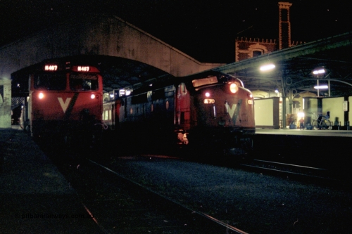 153-3-24
Geelong station building and platform, night shot, V/Line broad gauge passenger train, down Warrnambool with A class A 70 Clyde Engineering EMD model AAT22C-2R serial 84-1187 rebuilt from B 70 Clyde Engineering EMD model ML2 serial ML2-11 pauses at platform one with N class N 467 'City of Stawell' Clyde Engineering EMD model JT22HC-2 serial 86-1196 in platform two.
Keywords: A-class;A70;Clyde-Engineering-Rosewater-SA;EMD;AAT22C-2R;84-1187;rebuild;bulldog;