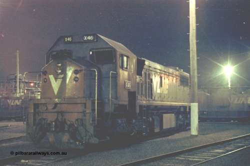 153-3-30
Geelong loco depot, stabled V/Line broad gauge locomotive X class X 46 Clyde Engineering EMD model G26C serial 75-793, night shot.
Keywords: X-class;X46;Clyde-Engineering-Rosewater-SA;EMD;G26C;75-793;