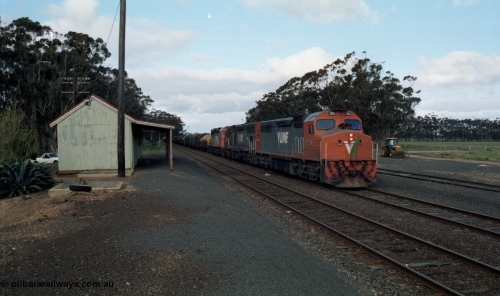 154-19
Lismore, V/Line broad gauge goods train 9169 to Adelaide via Cressy departs Lismore with a new train order for Ararat behind triple C class locomotives C 510 Clyde Engineering EMD model GT26C serial 76-833, C 508 serial 76-831 and C class leader C 501 'George Brown' serial 76-824, station building at left.
Keywords: C-class;C510;Clyde-Engineering-Rosewater-SA;EMD;GT26C;76-833;