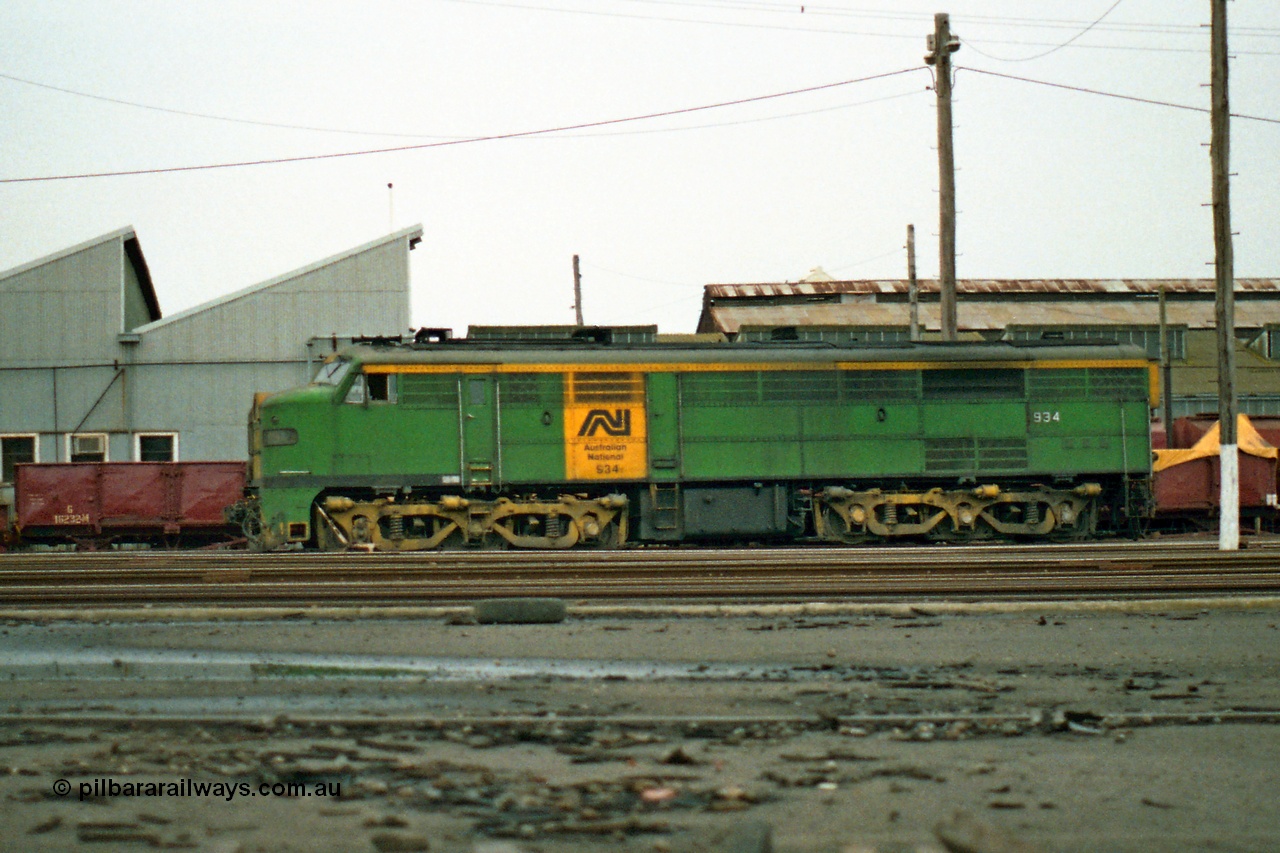 155-22
Melbourne Yard, derailed broad gauge Australian National 930 class 934 built in 1956 by AE Goodwin as ALCo model DL500B serial 81889 in AN livery, side view.
Keywords: 930-class;934;AE-Goodwin;ALCo;DL500B;81889;