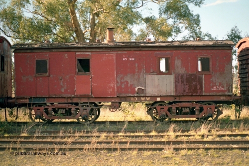 155-12
Wallan, stored 'OFF REG' waggon awaiting scrapping, bogie Ways and Works workmen's sleeper waggon, WW type 113 WW, side view, other side to 155-10. Originally built as a A type first class fixed six wheel carriage A 114 by Brown & Marshall of England in 1883, recoded to X type X 63 in circa 1910, then in 1946 converted to a workman's sleeper W type at Newport workshops as W 58. And in 1959 at Bendigo workshops fitted to a bogie underframe and converted to WW.
Keywords: WW-type;WW113;Brown&Marshall;A-type;A114;X-type;X63;W-type;W58;
