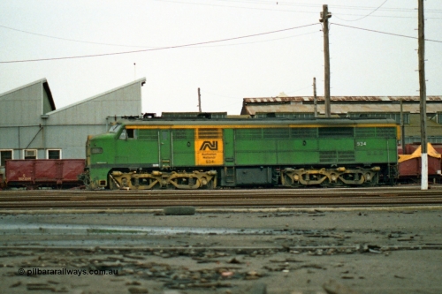155-22
Melbourne Yard, derailed broad gauge Australian National 930 class 934 built in 1956 by AE Goodwin as ALCo model DL500B serial 81889 in AN livery, side view.
Keywords: 930-class;934;AE-Goodwin;ALCo;DL500B;81889;