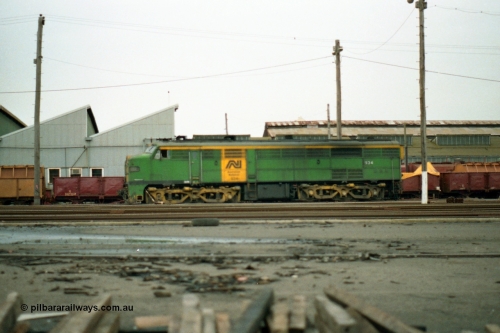 155-23
Melbourne Yard, derailed broad gauge Australian National 930 class 934 built in 1956 by AE Goodwin as ALCo model DL500B serial 81889 in AN livery, side view, off focus.
Keywords: 930-class;934;AE-Goodwin;ALCo;DL500B;81889;