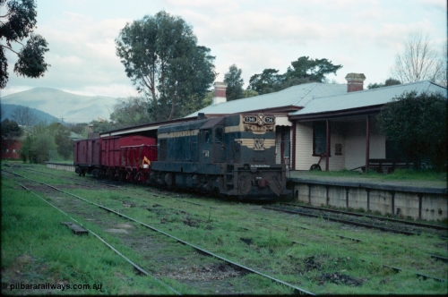 160-05
Healesville, station yard, building and platform, Yarra Valley Tourist Railway broad gauge loco Flat Top T class T 341 Clyde Engineering EMD model G8B serial 56-120 stand at the platform with a four wheel G type open waggon, a four wheel HD type van and a bogie ZLP type guards van.
Keywords: T-class;T341;Clyde-Engineering-Granville-NSW;EMD;G8B;56-120;