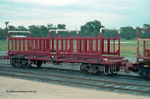 161-28
Tocumwal, V/Line broad gauge VZSX type bogie sleeper container waggon VZSX 100 converted from a VLCX / VLX type louvre van between 1987-89, with empty VWS type sleeper transport containers VWS 001 and VWS 009.
Keywords: VZSX-type;VZSX100;VLX-type;