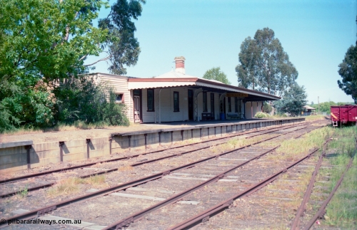 162-1-11
Healesville, station yard view looking south, station building and platform, yard overview, freshly repainted GY type four wheel waggon in yard.
