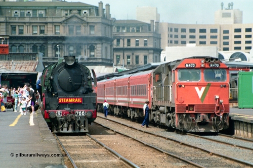 162-1-16
Spencer Street Station, platforms 4 and 5 view, broad gauge Steamrail R class loco R 766 North British Locomotive Company, Glasgow, Scotland model Hudson serial 27056 and V/Line N class N 470 'City of Wangaratta' Clyde Engineering EMD model JT22HC-2 serial 86-1199 during the PTC Open Day.
Keywords: R-class;R766;North-British-Locomotive-Company;Hudson;27056;