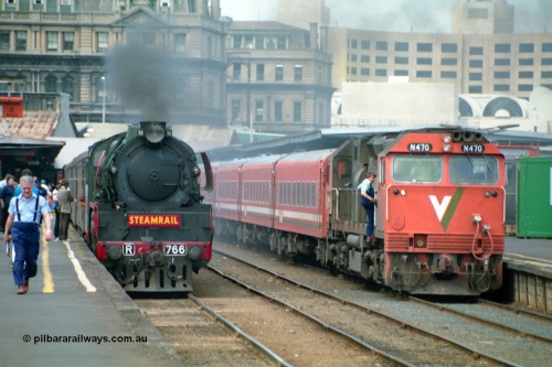 162-1-17
Spencer Street Station, platforms 4 and 5 view, broad gauge Steamrail R class loco R 766 North British Locomotive Company, Glasgow, Scotland model Hudson serial 27056 and V/Line N class N 470 'City of Wangaratta' Clyde Engineering EMD model JT22HC-2 serial 86-1199 during the PTC Open Day.
Keywords: R-class;R766;North-British-Locomotive-Company;Hudson;27056;