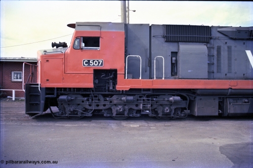 162-3-05
Melbourne Yard, broad gauge V/Line 3,000 horsepower diesel electric locomotive C class C 507 Clyde Engineering EMD model GT26C serial 76-830, cab side view, shows automatic staff exchanger, bogie steps and hand brake, at the PTC Open Day.
Keywords: C-class;C507;Clyde-Engineering-Rosewater-SA;EMD;GT26C;76-830;