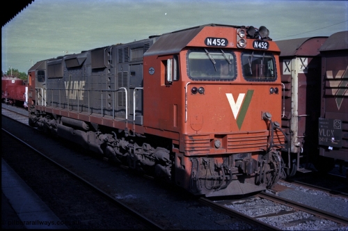 162-3-25
Seymour, stabled V/Line diesel electric locomotive N class N 452 'Rural City of Wodonga' Clyde Engineering EMD model JT22HC-2 serial 85-1220 sits opposite the station building waiting to run the Sunday evening down Cobram passenger train, beside it is stabled down Wodonga goods train 9303.
Keywords: N-class;N452;Clyde-Engineering-Somerton-Victoria;EMD;JT22HC-2;85-1220;