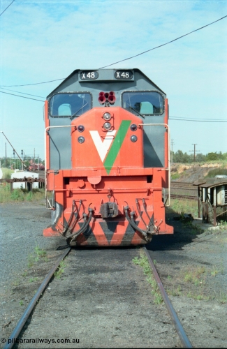 163-14
Seymour loco depot, V/Line broad gauge locomotives third series X class X 48 Clyde Engineering EMD model G26C serial 75-795, cab front on view, wind deflectors are clearly visible on each side of the cab.
Keywords: X-class;X48;Clyde-Engineering-Rosewater-SA;EMD;G26C;75-795;