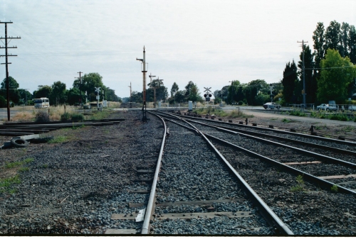 163-17
Avenal station yard overview looking north across Bank Street with Siding B removed, but still across road, and redundant and stripped disc signal posts 9 and 11, double semaphore signal post 14, the up home is still active for the time being.
