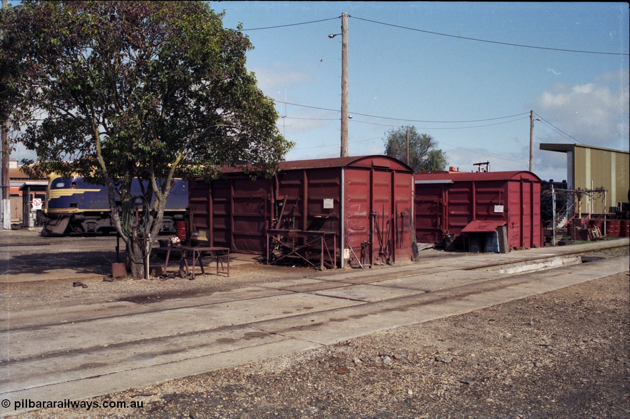 165-09
Wodonga loco depot, rear of fuel point, two grounded B class vans, service pit, fitters, examiners work area, B class in the background.
