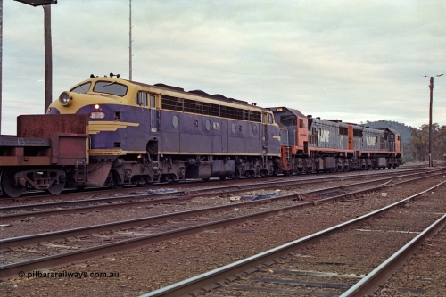 166-11
Albury South Yard, V/Line broad gauge up Long Island slab steel train 9334 awaits departure time behind the lash-up of X classes X 46 and X 45 'Edgar H Brownbill' Clyde Engineering EMD models G26C serials 75-793 and 75-792 with veteran B class Bulldog B 75 Clyde Engineering EMD model ML2 serial ML2-16.
Keywords: B-class;B75;Clyde-Engineering-Granville-NSW;EMD;ML2;ML2-16;bulldog;