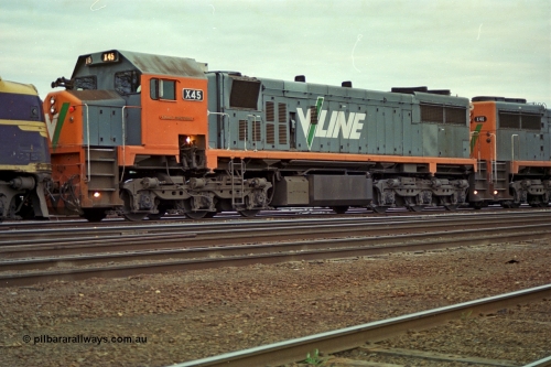 166-12
Albury, V/Line broad gauge third series X class leader X 45 'Edgar H Brownbill' Clyde Engineering EMD model G26C serial 75-792 in the shafts of train 9334.
Keywords: X-class;X45;Clyde-Engineering-Rosewater-SA;EMD;G26C;75-792;