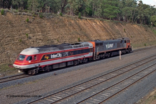 166-23
Heathcote Junction, V/Line standard gauge X class locomotive X 37 Clyde Engineering EMD model G26C serial 70-700 tows damaged NSWSRA XPT power car XP 2007 'City of Albury' to Melbourne, August 28, 1991. XP 2007 was damaged at Henty on May 3.
Keywords: X-class;X37;Clyde-Engineering-Granville-NSW;EMD;G26C;70-700;