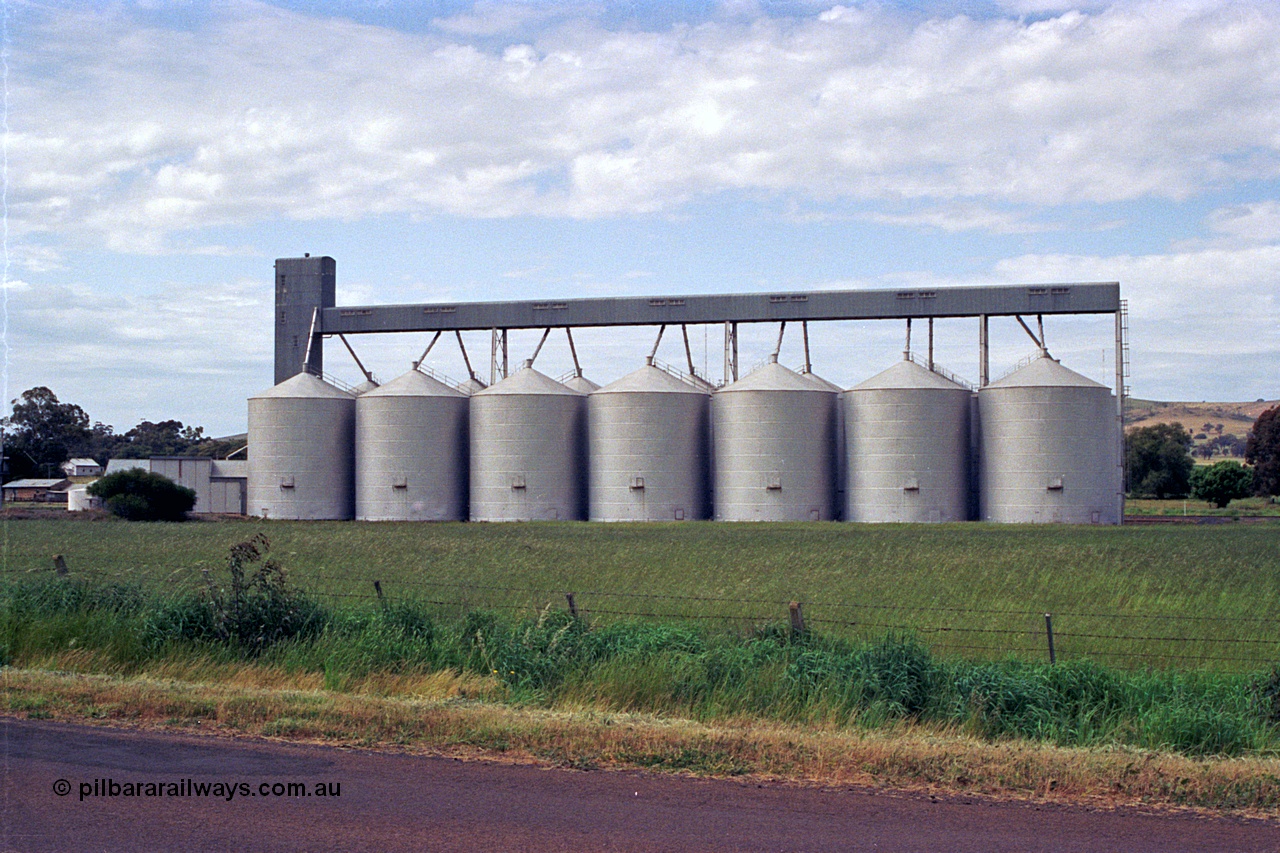 170-02
Dookie, Grain Elevators Board sub-terminal site, large Ascom style steel silo complex, located west of the station, viewed from road.
