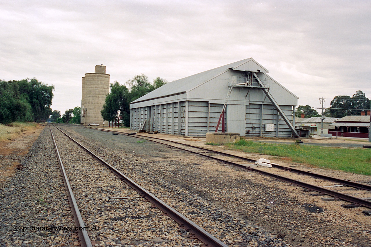 170-14
Devenish station yard overview looking north towards Oaklands, Victorian Oat Pool horizontal bunker, Williamstown style silo complex in the distance.
