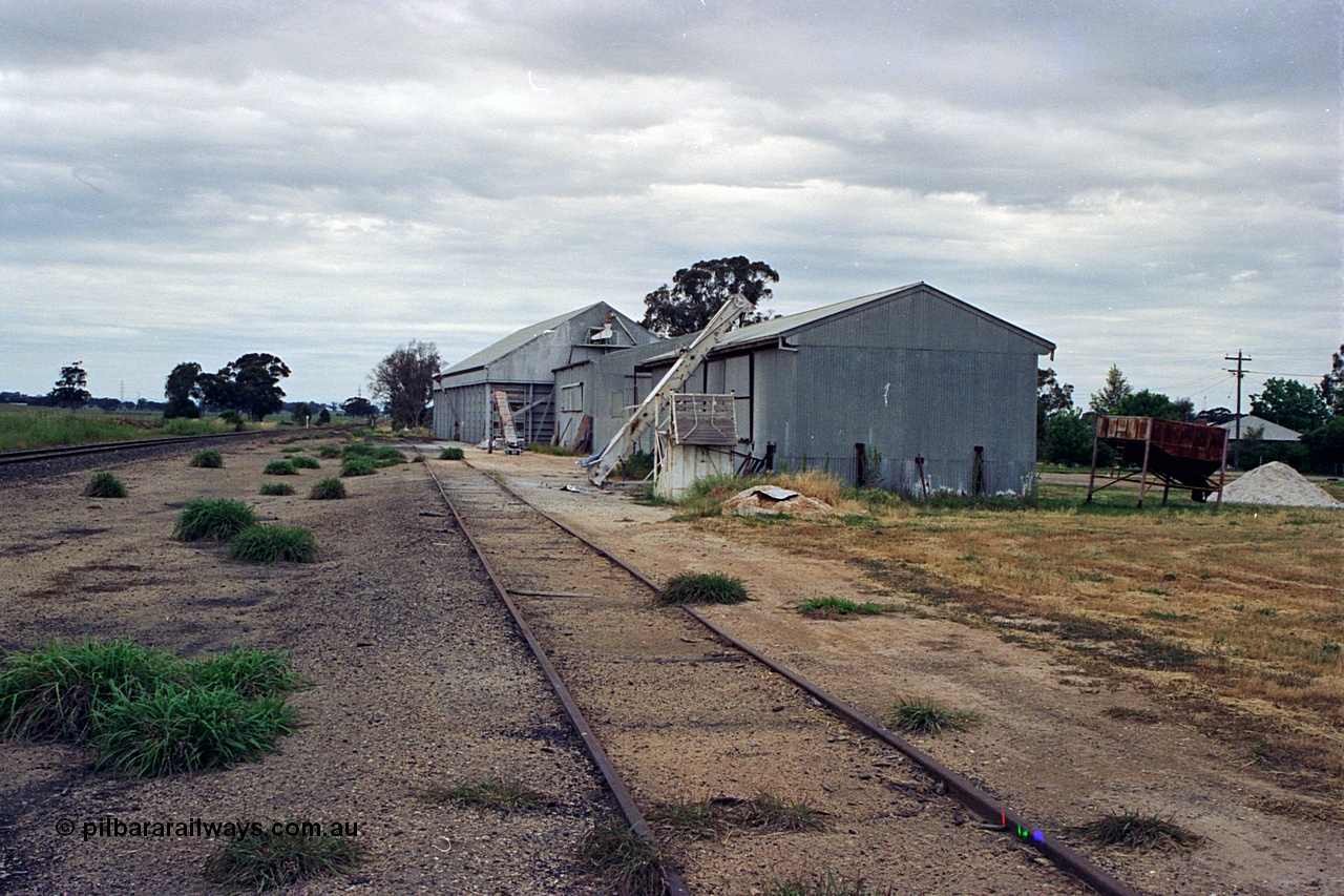 170-20
Goorambat, yard view looking towards Benalla, super phosphate sheds with a Victorian Oat Pool shed beyond them.
