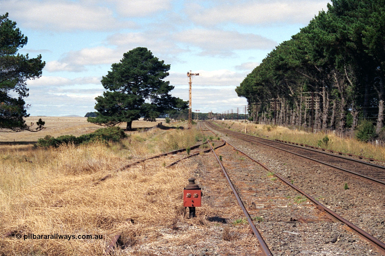 171-10
Trawalla station yard overview, looking towards Melbourne, end of No.3 Rd former stock yards would be directly left of this image, point indicator for catch points in grass, Down Home semaphore Signal Post 4 for moves from No.2A Road to No.2 Road.
