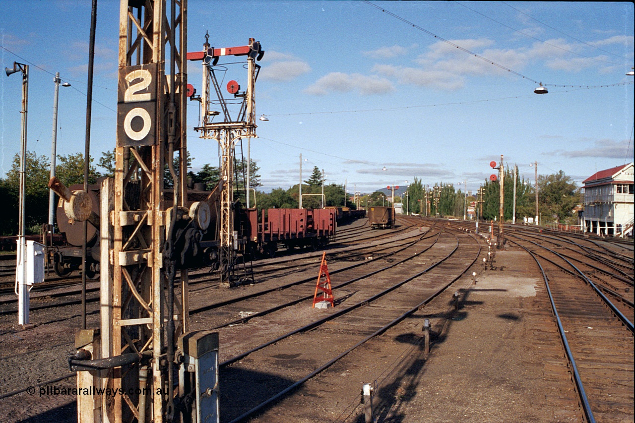 171-21
Ballarat station yard overview, A signal box on right, looking towards Melbourne, semaphore signals and discs, yard about to be rationalised and electric colour light signals installed.
