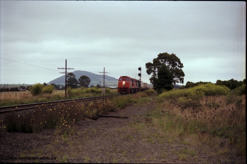172-12
Bungaree Loop, broad gauge V/Line C classes C 502 Clyde Engineering EMD model GT26C serial 76-825, C 506 serial 76-829 and C 509 serial 76-832, up Adelaide goods train 9150.
Keywords: C-class;C502;Clyde-Engineering-Rosewater-SA;EMD;GT26C;76-825;