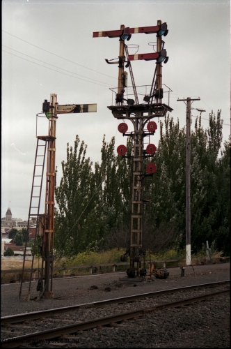 172-19
Ballarat yard, semaphore and disc signal posts 11 facing the camera and 9B facing away.
