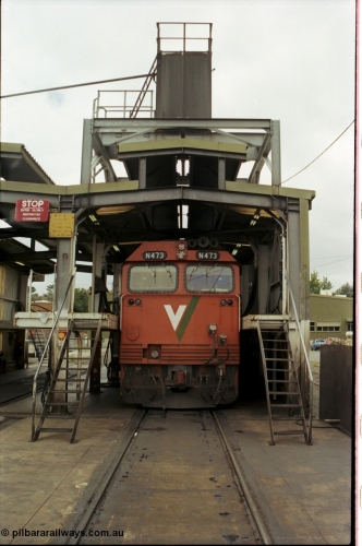 172-31
Ballarat East loco depot, fuel and sanding point, V/Line broad gauge N class N 473 'City of Warragul' Clyde Engineering EMD model JT22HC-2 serial 87-1202, cab front shot.
Keywords: N-class;N473;Clyde-Engineering-Somerton-Victoria;EMD;JT22HC-2;87-1202;