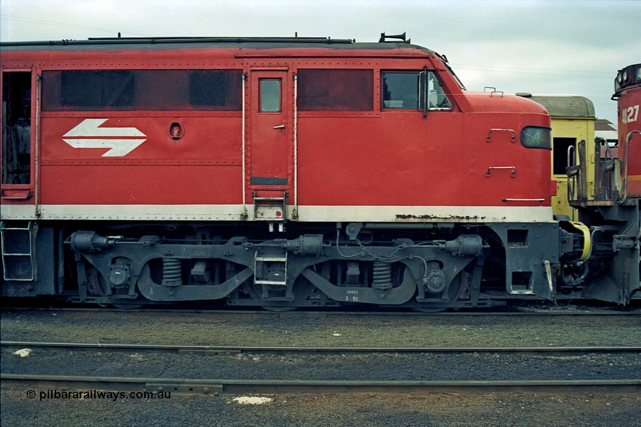 174-14
Albury loco depot, fuel point area, NSWSRA standard gauge 44 class 4456 AE Goodwin ALCo model DL500B serial 83746 in Red Terror livery, cab side shot.
Keywords: 44-class;4456;AE-Goodwin;ALCo;DL500B;83746;
