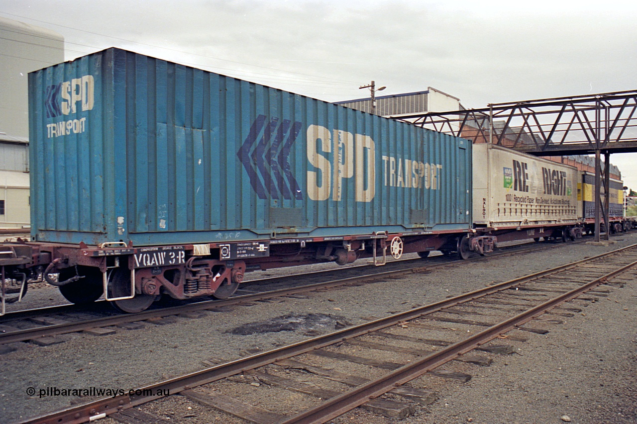 174-16
Albury, yard view looking north, V/Line standard gauge VQAW type VQAW 3, three pack articulated container waggon built by V/Line Ballarat North Workshops and issued to traffic 21-03-1990, loaded with three 40' containers on a south bound goods train.
Keywords: VQAW-type;VQAW3;V/Line-Ballarat-Nth-WS;