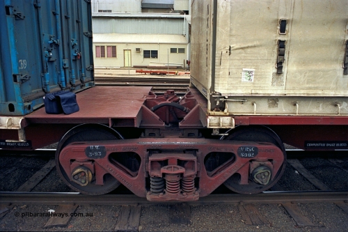 174-17
Albury, V/Line standard gauge Road Master bogie and articulated joint detail of VQAW type VQAW 3 three pack articulated container waggon built by V/Line Ballarat North Workshops and issued to traffic 21-03-1990.
Keywords: VQAW-type;VQAW3;V/Line-Ballarat-Nth-WS;