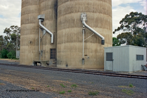 175-17
Pine Lodge, track view looking at load-out spouts on Williamstown style silo complex, staff / storage shed.
