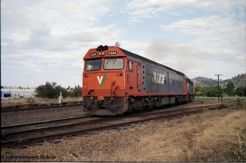 176-13
Wodonga, V/Line standard gauge up goods train behind the G class G 524 Clyde Engineering EMD model JT26C-2SS serial 86-1237 and C class C 505 Clyde Engineering EMD model GT26C serial 76-828 combination at the Bandiana junction, broad gauge track on the left, and the broad gauge line to Bandiana and former Cudgewa line curving around to the right.
Keywords: G-class;G524;Clyde-Engineering-Rosewater-SA;EMD;JT26C-2SS;86-1237;
