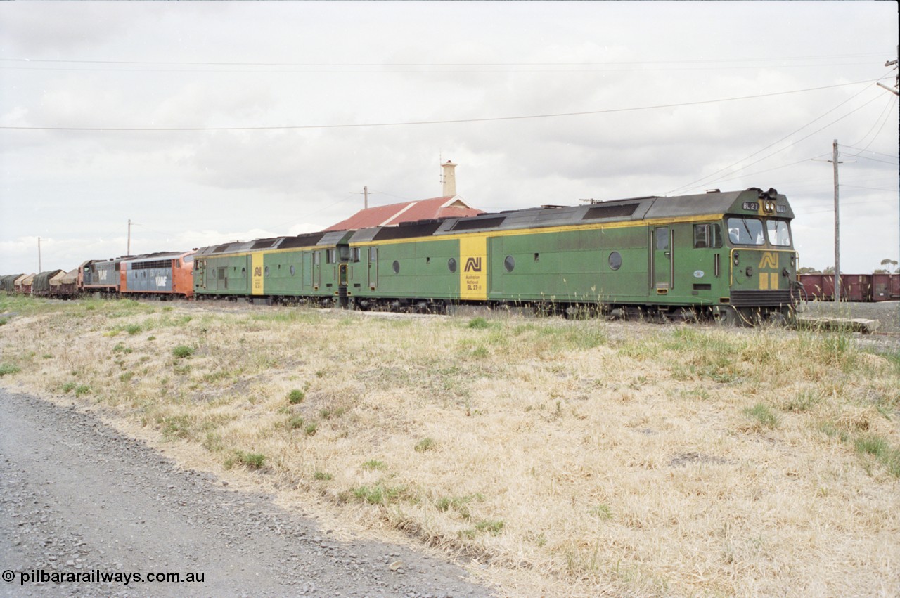 177-23
Gheringhap, down V/Line broad gauge goods train to Adelaide 9169 with the quad power combo of a pair of Australian National BL class locomotives BL 27 Clyde Engineering EMD model JT26C-2SS serial 83-1011 and class leader BL 26 'Bob Hawke' serial 83-1010 and V/Line S class S 313 'Alfred Deakin' Clyde Engineering EMD model A7 serial 61-230 and X class X 53 Clyde Engineering EMD model G26C serial 75-800, BL 27 had Paul Keating drawn on the LHS cab as it was just after he'd taken the Labor Party leadership and the Prime Ministership off Bob Hawke.
Keywords: BL-class;BL27;Clyde-Engineering-Rosewater-SA;EMD;JT26C-2SS;88-1011;